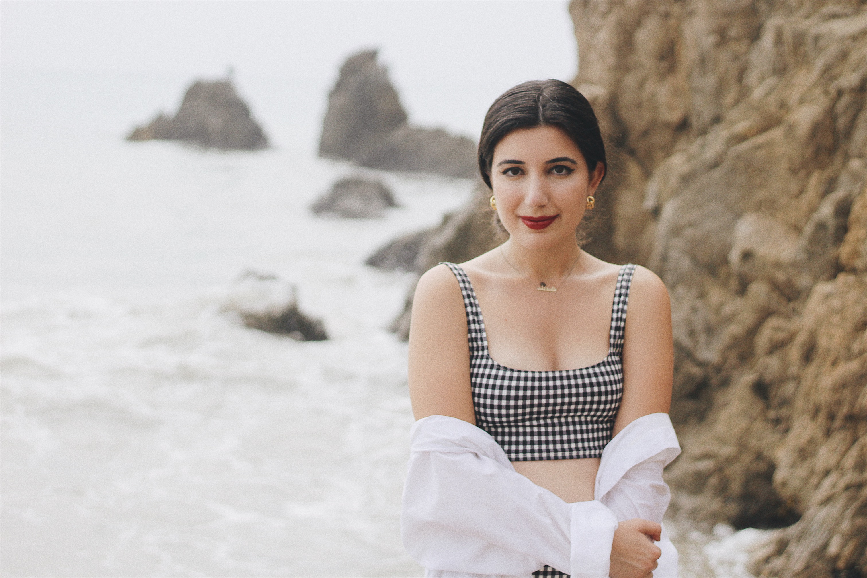 vintage swimsuit, sustainable swimwear, retro, oversized shirt, beach cover up, lookbook, fashion, beach style, Audrey Hepburn style, Malibu, beach, El Matador, fashion blogger, fashionista, gold hoop earrings, red lips, updo