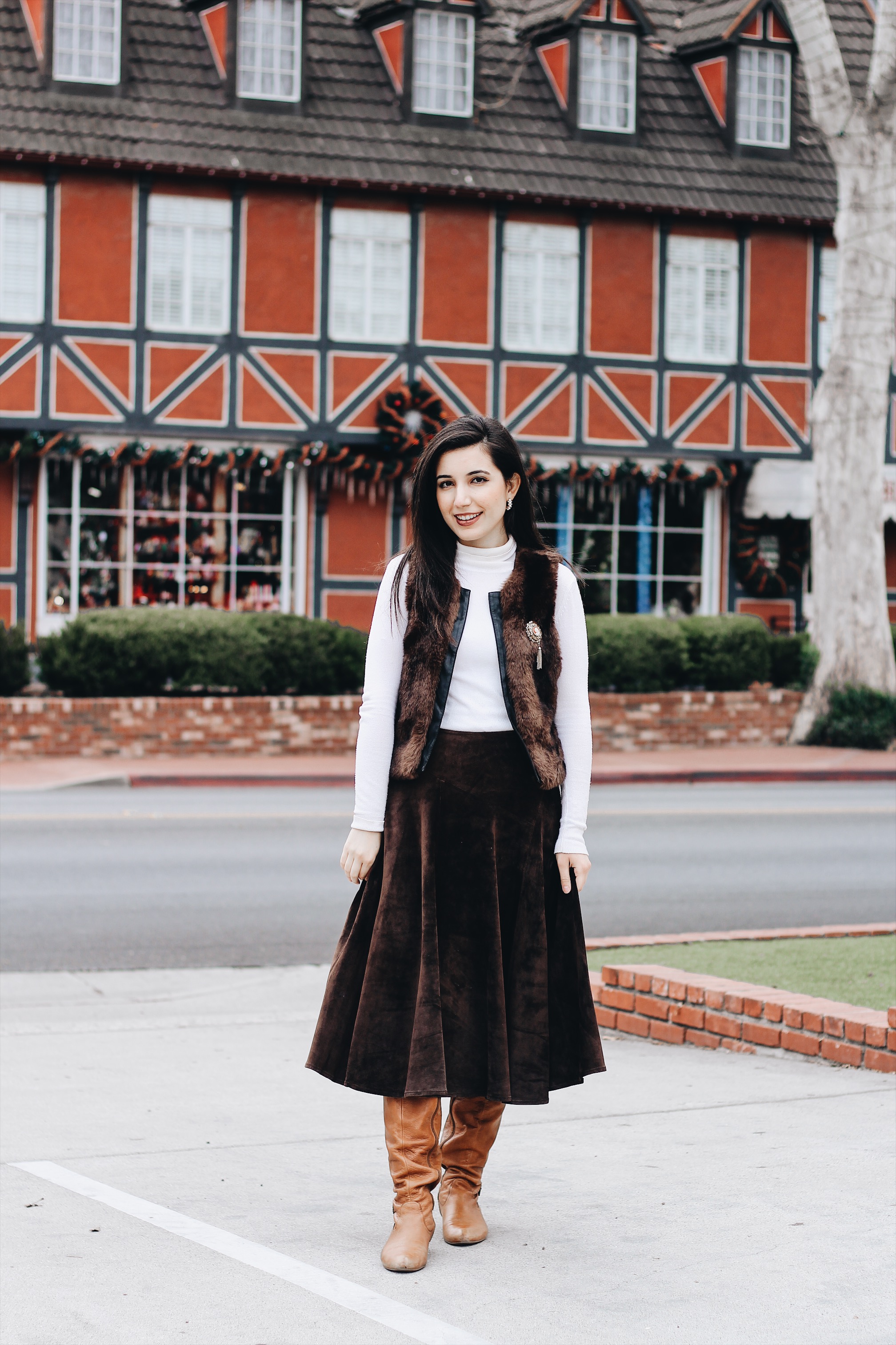 Solvang, CA, ALDO boots, fur vest, ootd, outfit of the day, California, CA, suede skirt, Jones New York, cameo brooch, white turtleneck, European, European outfit, lookbook, fashion blogger, travel