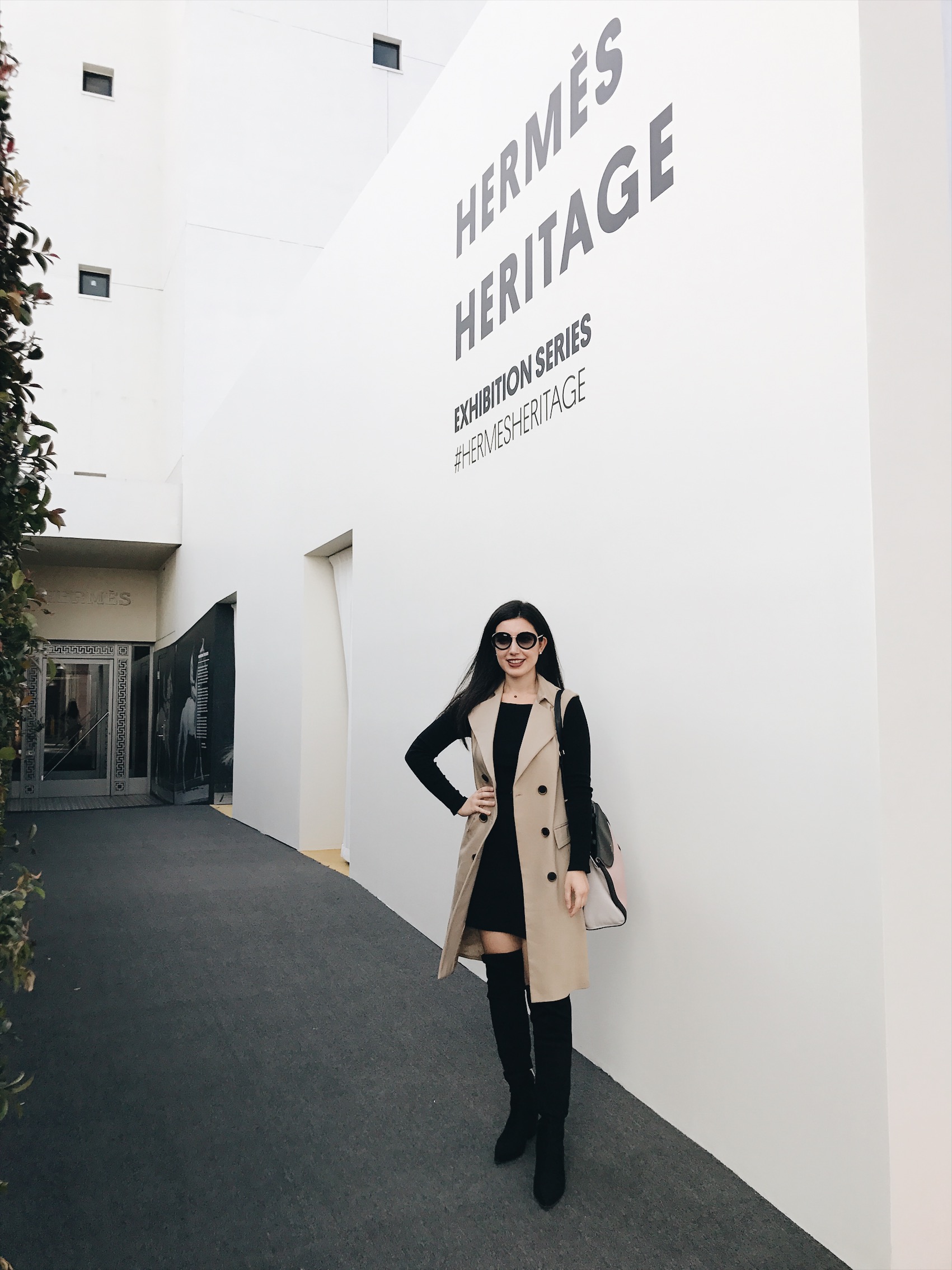 Hermes Heritage Beverly Hills Exhibition, Hermes, fashion, fashion exhibits, museum pop up, high fashion, Los Angeles Beverly Hills, fashion blogger, over-the-knee boots, black suede boots Prada sunglasses, trench coat, black skirt, black crop top