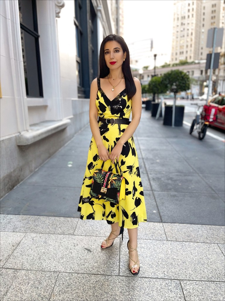 Jason Wu, Emily in Paris, Emily Cooper, floral dress, Ganni dress, Emily in Paris yellow dress, Aldo, Jennifer Lopez shoes, Chanel, gold chain necklace, vintage, maxi dress, summer dress, sundress