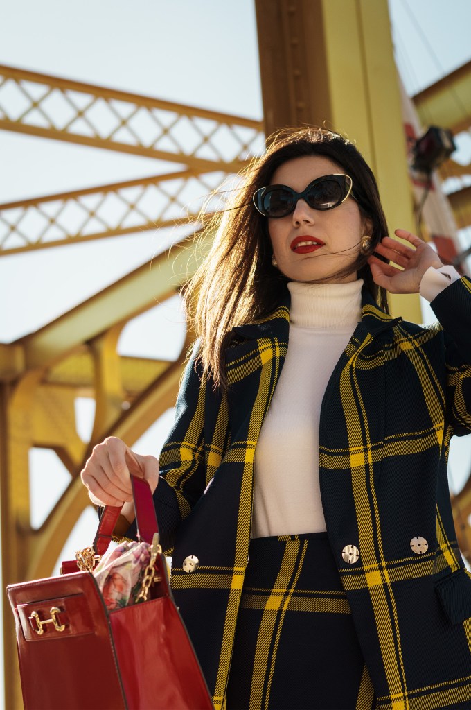 Sacramento, Tower Bridge, California capital, travel, fashion, skirt suit, plaid, Milly, Burberry, Etro, fashion month, Milan Fashion Week, London Fashion Week, fashion week trends, red bag, white boots, knee-high boots, square toe boots, turtleneck, European fashion, British fashion