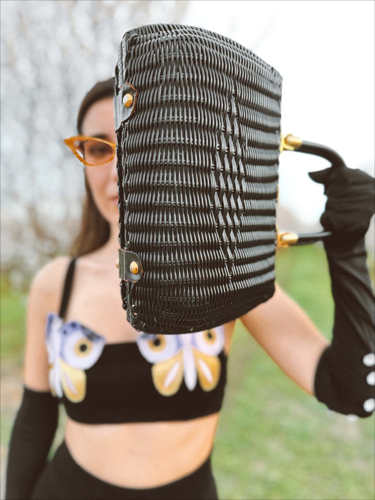 Autumn Adeigbo, knitwear, crop top, butterfly top, vintage earrings, opera gloves, spring 2023 fashion trends, fashion month, couture week, Paris fashion week, Milan fashion week, runway, wicker bag, vintage purse, suede boots