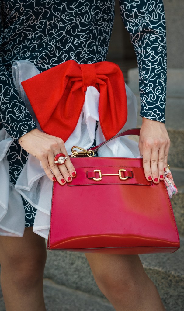 I could not believe that I was walking in such an avant garde gown past a league of legislators and tourists. In cherry-red pumps reminiscent of Dorothy’s ruby slippers, I strutted across the checkered tiles outside the California State Capitol, in place of a yellow brick road. 